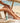 naturecell-bodyoil-paa-strand-med-ben